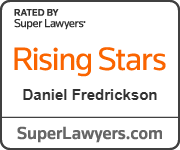Super Lawyers Rising Stars badge featuring attorney Daniel Fredrickson. The badge includes the orange Rising Stars logo and SuperLawyers.com, indicating recognition through the Super Lawyers multiphase selection process involving independent research, peer nominations, and peer evaluations. The Rising Stars list honors top attorneys under 40 or with less than 10 years of practice who have demonstrated excellence in their field.